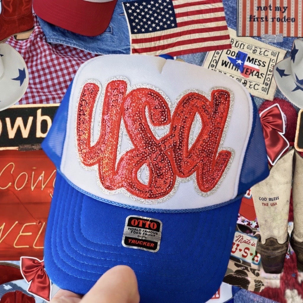 Red, white, and a lil’ feral Trucker Hat✨